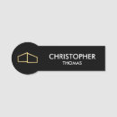 Search for black and gold name tags Real estate