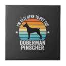 Recherche de dobermann carreaux Animal