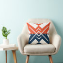 Search for orange and navy pillows Geometric
