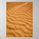 Search for footprints in the sand posters Desert