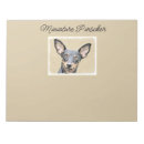 Recherche de pinscher blocsnotes Chiot