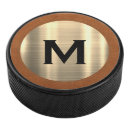 Search for gold hockey pucks Initial
