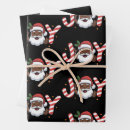 Search for black santa gift wrap African