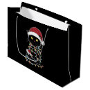 Search for christmas cat gift bags Matching