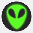 Search for glowing green stickers Alien