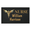 Search for black and gold name tags Caduceus