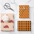 Recherche de coccinelles rouges papier cadeau Noir