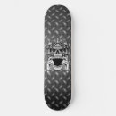 Recherche de deux skateboards Crâne