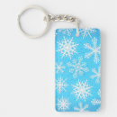 Search for snowflake on blue keychains Abstract