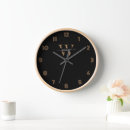 Search for black and gold clocks Typography