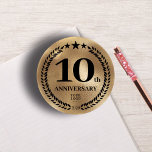 10th Business Anniversary Gold Paperweight<br><div class="desc">Gold foil style 10th-anniversary round paperweight with a business logo. Ideal for the employees or as promotional supplies for customers. Commemorative design with a laurel branch and stars. The logo can be changed for text by clicking the button to edit the design.</div>