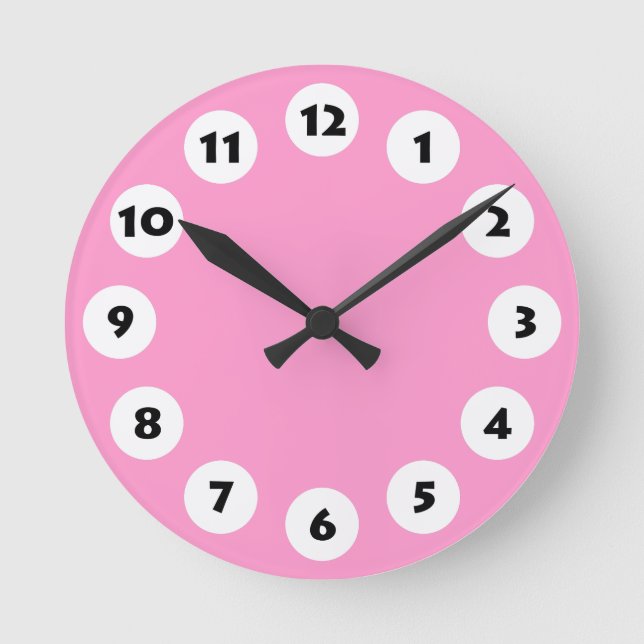 12 Spots - Black with White on Pink Round Clock (Front)