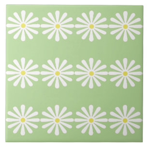 12 white daisies with yellow centres on mint green tile