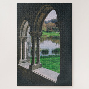 13th century Medieval gothic cloister by a lake Jigsaw Puzzle