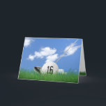 16th birthday golf ball in grass card<br><div class="desc">White golf ball in green grass with golf club and sky background for 16th birthday.</div>