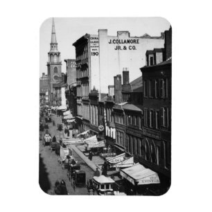 1859: Traffic and shops on Washington Street Magnet