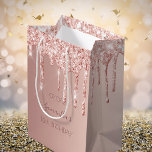 18th birthday 18 rose gold glitter drips medium gift bag<br><div class="desc">A gift bag for a girly and glamourous 18th birthday.  A faux rose gold background with an elegant faux rose gold glitter drips,  paint drip look. The text: The name is written in dark rose gold with a modern hand lettered style script. Tempate for a date and age 18.</div>