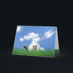18th birthday golf ball in grass card<br><div class="desc">White golf ball in green grass with golf club and sky background for 18th birthday.</div>