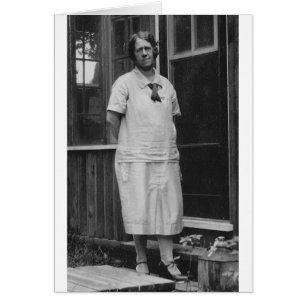 1920's Lady standing outside of building