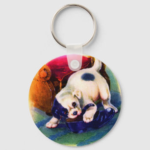 1930s adorable puppy no. 3 chewing on a shoe keychain