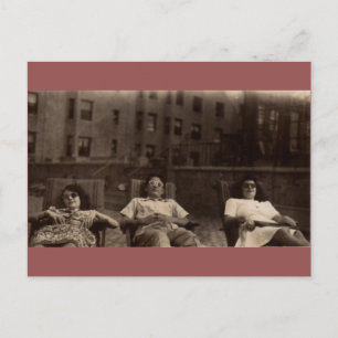 1940s three people relaxing on the roof postcard