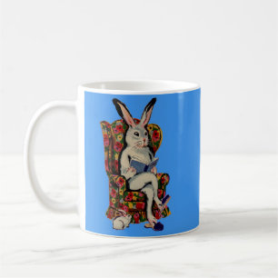 1950s seated big bunny reads story to baby bunny coffee mug