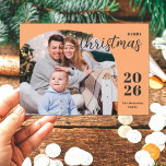 1 photo Christmas arch modern minimalist orange Holiday Card<br><div class="desc">This elegant and modern Christmas greeting card features a minimalist design displaying 1 of your favourite family pictures inside a trendy arch frame. Easily customizable with your family name and the current year in stylish serif fonts over a modern light orange shade background.</div>