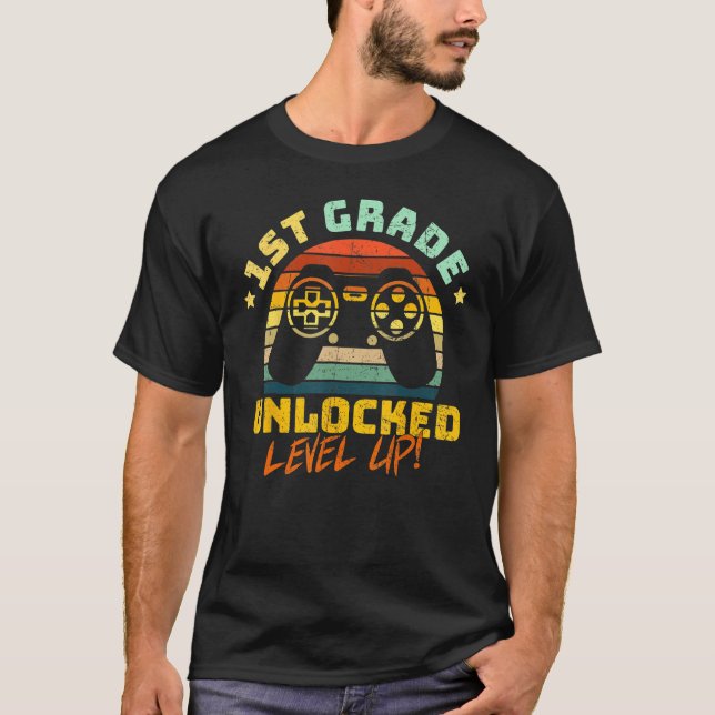 1st First Grade Unlocked Level Up Game Back To Sch T-Shirt (Front)