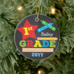 1st Grade First Grade Keepsake Chalkboard Colourfu Ceramic Ornament<br><div class="desc">This first grade ornament features a star, a ruler, a pencil, crayons and bold, colourful fun typography! Click the customize button for more options for modifying the text! Variations of this design, additional colours, as well as coordinating products are available in our shop, zazzle.com/store/doodlelulu. Contact us if you need this...</div>