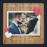1st Wedding Anniversary  – Rustic Wood & Hearts Square Wall Clock<br><div class="desc">Celebrate your first wedding anniversary with this beautiful personalized wall clock! Featuring a rustic wood background, romantic hearts, and your custom photo in the centre, this design blends charm and warmth for a timeless keepsake. The elegant "1st Wedding Anniversary" script (Great Vibes) pairs perfectly with clean modern text (Quicksand) to...</div>