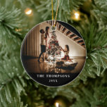 2024 Family Photo Picture On Both Sides Christmas Ceramic Ornament<br><div class="desc">Embrace the modern elegance of the season with our Elegant 2024 Family Photo Minimalist Black Modern Ceramic Ornament. This sophisticated ornament is the perfect addition to your holiday decor, showcasing your family's love and togetherness while exuding contemporary style. Crafted from premium ceramic, this ornament features a sleek black finish that...</div>