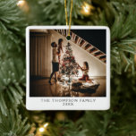 2024 Family Photo Picture On Both Sides Christmas Ceramic Ornament<br><div class="desc">Capture the essence of your family’s holiday spirit with our 2024 Family Photo Picture On Both Sides Christmas Ceramic Ornament. This personalized ornament allows you to showcase your favourite family photos on both the front and back, creating a cherished keepsake that celebrates your loved ones. With its simple, minimal, and...</div>