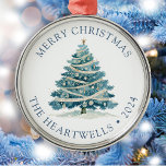 2024 Personalized Blue Watercolor Christmas Tree Metal Ornament<br><div class="desc">This holiday ornament features a blue watercolor Christmas tree decked with ribbons and ornaments. The words "Merry Christmas" appear in blue serif font,  with your family's name and the year below.</div>