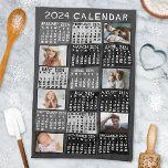 2024 Year Monthly Calendar Photo Collage Mod Black Kitchen Towel<br><div class="desc">This personalized 2024 year monthly calendar kitchen towel has a mid-century modern geometric look with asymmetrical colour blocks and cut-out paper style typography. The colours are various shades of black, white, and grey. Use the easy templates to add six of your favourite photos (horizontal work best, but all shapes will...</div>