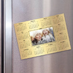 2025 Calendar Custom Photo Gold Foil Family Magnet<br><div class="desc">Create this usable keepsake for you family and friends so they will remember you year-round with this graphic, elegant 2025 calendar magnet card. Bold white handwritten script typography, your custom photo and a simple, modern 12 month calendar overlay a faux gold ombre foil background. Personalize with the photo of your...</div>