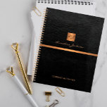 2025 Classy elegant black leather gold monogrammed Planner<br><div class="desc">Luxury exclusive looking office or personal monogrammed planner featuring a faux copper metallic gold glitter square with your monogram name initials and a sparkling stripe over a stylish black faux leather background. Suitable for small business, corporate or independent business professionals, personal branding or stylists specialists, makeup artists or beauty salons,...</div>