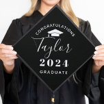2025 Graduate Minimalist Black Custom Graduation Graduation Cap Topper<br><div class="desc">Stylish custom graduation cap topper design features modern and minimalistic style congratulations wording that can be personalized with your graduate's name in script and their graduation class year. Note,  white text / grad cap image and black background colours can be modified.</div>