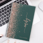 2025 Personalized Emerald Green Rose Gold Glitter Planner<br><div class="desc">Personalize this elegant modern design with your name in vertical rose pink signature handwriting script on an emerald green background trimmed with a rose gold faux glitter border. Add the year in sans serif font. (To keep the swashes at the beginning and end of the name, replace only the letters,...</div>
