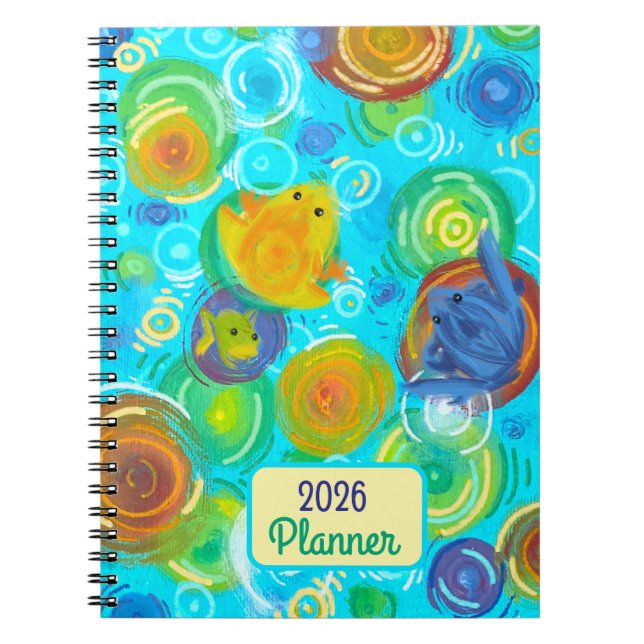 2026 Planner with colourful frogs on colourful wat Notebook (Front)