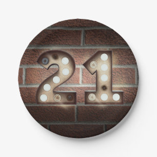 21st birthday marquee sign on brick wall paper plate