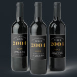 21st Birthday Name 2004 Black Gold Elegant Chic<br><div class="desc">2004 Vintage 21st Birthday Black & Gold Elegant Wine Label. Celebrate your milestone with our exclusive birthday wine label. The meticulously designed label with stunning black and gold hues effortlessly enhances the visual appeal of your favourite wine. The year prominently featured on the label, adds a nostalgic throwback to the...</div>