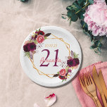 21st birthday party white gold geo floral burgundy paper plate<br><div class="desc">A plate for a 21st birthday party. A chic white background with a faux gold geometric frame. Decorated with dark purple and burgundy flowers, roses and boho style feathers. Templates for a name, age 21 and a date. Date of birth or the date of the party. The name is written...</div>