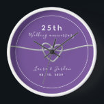 25th Wedding Anniversary Gift for Couple Clock<br><div class="desc">Celebrate 25 years of love with this simple,  modern,  and elegant personalized wall clock. Featuring a chic purple design,  this stunning anniversary gift is customized with your names,  special date,  and a charming silver rope heart symbolizing your timeless love. A perfect keepsake to commemorate a quarter-century of beautiful memories.</div>