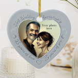 25th Wedding Anniversary Photo Ceramic Ornament<br><div class="desc">Celebrate 25 years of marriage with a special custom photo ornament in a delightful heart shape frame. Simply upload your own photo of the married couple and it will appear in the cutout. The silver-grey surround features a script font and decorations. (Please note that no actual metallic or shiny ink...</div>