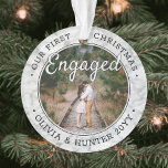 2 Photo 1st Christmas Engaged Elegant Faux Marble Ornament<br><div class="desc">Celebrate the joyful 1st holiday of your engagement with a custom 2 photo "Our First Christmas Engaged" round faux marble acrylic ornament. All text and images on this template are simple to personalize and can be different or the same on front and back.(IMAGE & TEXT DESIGN TIPS: 1) To adjust...</div>