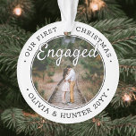 2 Photo 1st Christmas Engaged Modern Black & White Ornament<br><div class="desc">Celebrate the joyful 1st holiday of your engagement with a custom 2 photo "Our First Christmas Engaged" round acrylic ornament. All text and images on this template are simple to personalize and can be different or the same on front and back. (IMAGE & TEXT DESIGN TIPS: 1) To adjust position...</div>