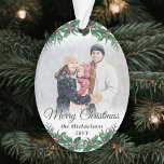 2 Photo Elegant Holly Greenery Merry Christmas Ornament<br><div class="desc">Celebrate the simple joys of the holidays with a custom Merry Christmas two photo oval acrylic ornament. The pictures and all wording on this template are easy to personalize and can be different or the same on front and back. The script can be changed to First Christmas, Seasons Greetings, a...</div>