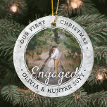 2 Photo First Christmas Engaged Modern Faux Marble Ceramic Ornament<br><div class="desc">Celebrate the joyful 1st holiday of your engagement with a custom 2 photo "Our First Christmas Engaged" round faux marble ceramic ornament. All text and images on this template are simple to personalize and can be different or the same on front and back.(IMAGE & TEXT DESIGN TIPS: 1) To adjust...</div>