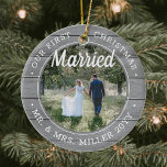 2 Photo Our First Christmas Married Faux Grey Wood Ceramic Ornament<br><div class="desc">Celebrate a joyful 1st holiday as Mr. and Mrs. with a custom 2 photo "Our First Christmas Married" round faux grey wood ceramic ornament. All text and images on this template are simple to personalize and can be different or the same on front and back. (IMAGE & TEXT DESIGN TIPS:...</div>