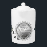 2 Photos 20th Wedding Anniversary Platinum Emblem<br><div class="desc">Looking for that unique,  original graphics,  20th wedding anniversary designed porcelain teapot for them? Then this might be it; original artwork,   porcelain graphics and silvery emblem on this stunningly printed white teapot! They'll enjoy having it all year round as well :)</div>